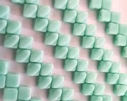 SQ206-63110 Opaque light turquoise green - 40 beads